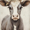 A close-up painting of a Highland cow's head with brown fur and white markings, adorned with a floral wreath.