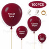 A collection of deep burgundy latex balloons in various sizes including 18 inch, 12 inch, 10 inch, and 5 inch, with a 100 pie