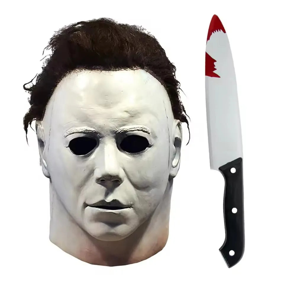 A white latex mask shaped like a human face with a menacing expression.