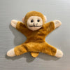 A fluffy, golden-brown elephant plush toy with light beige accents.