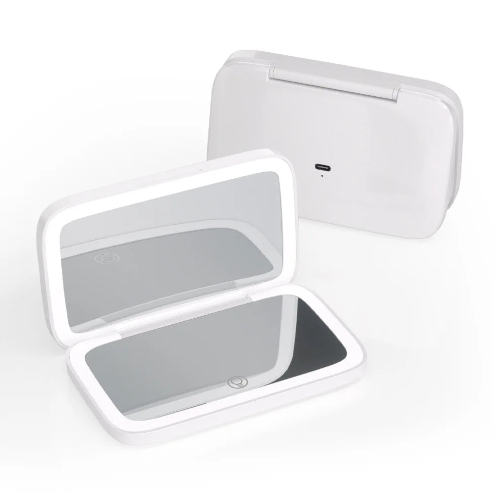 A white portable touch screen makeup mirror with an open lid displaying a reflective surface.