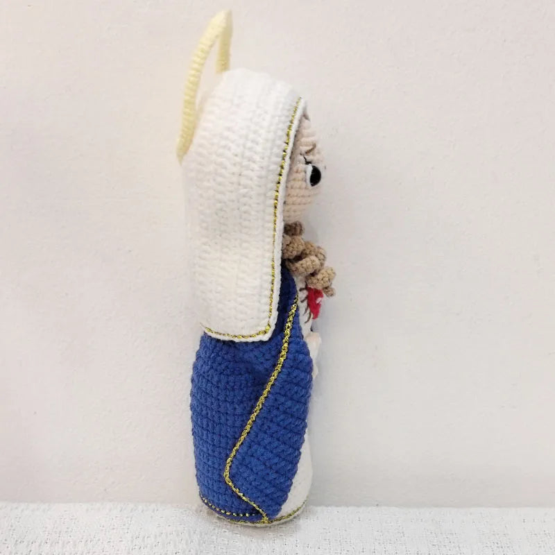 Handcrafted Virgin Mary crochet doll with white and blue fabric details