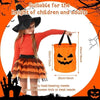 An adult woman holds an orange pumpkin tote bag with a carved face design against an orange background.