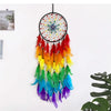 A colorful feather dream catcher wind chime decorative pendant with vibrant rainbow colors.