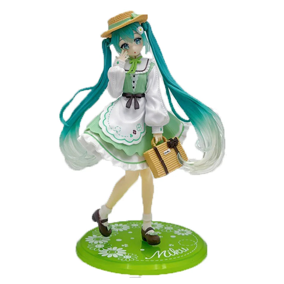 A PVC collectible figurine of Hatsune Miku in a green and white outfit with long teal hair and a straw hat.