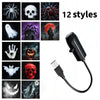 A set of 12 Halloween style ghost and skull projectors with black cords.