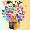 A colorful surprise box overflowing with various squishy stress relief toys and mystery items.