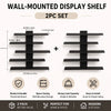 A set of four black wall-mounted display shelves for home or office use.