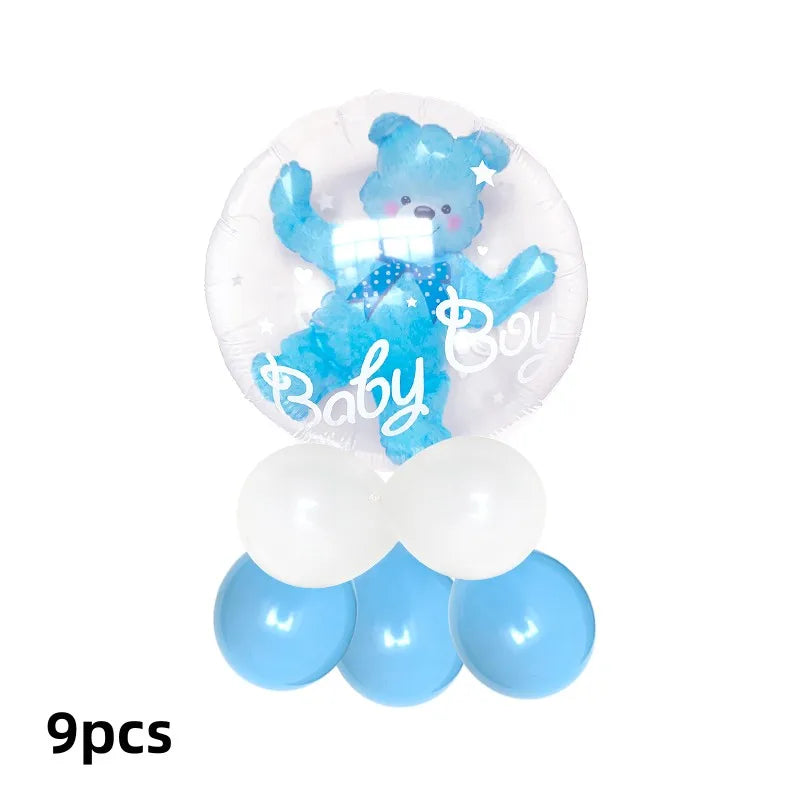 A clear foil balloon shaped like a blue bear with a bow tie for birthday and baby shower decorations