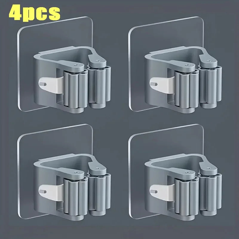 Four wall mounted holders for storing mops and brooms in a silver finish