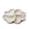 A light beige heart-shaped four-compartment snack tray with rounded edges.