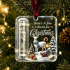 Clear acrylic ornament featuring a reindeer and Christmas tree design with a velvet ribbon.