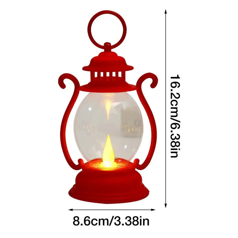 A red retro battery-powered desk lamp with a clear glass globe and a metal top.