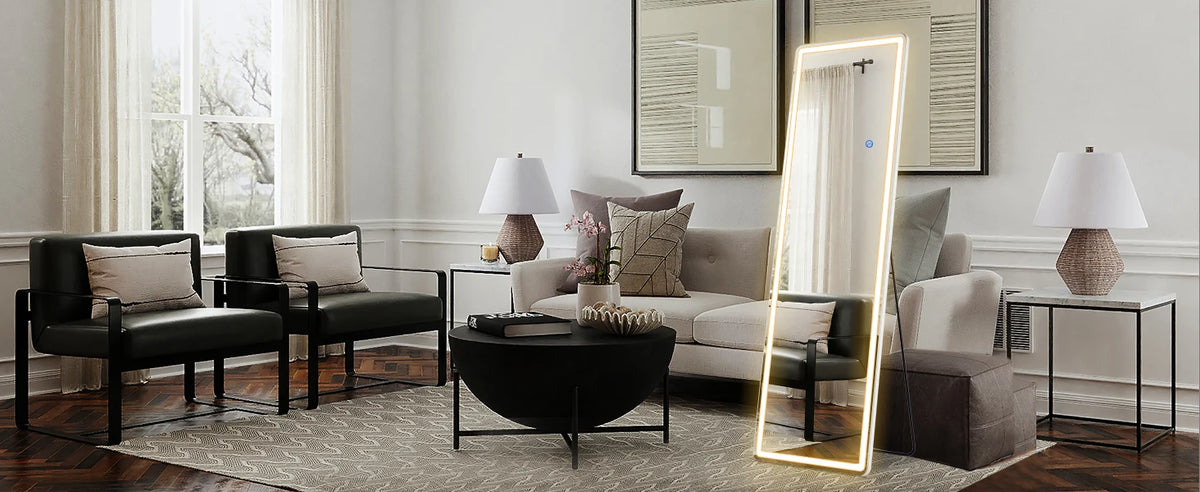 A full-length LED floor mirror with a glowing frame is displayed in a modern living room setting.