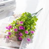 Artificial eucalyptus branch with seven green stems used for home decor or wedding arrangements.