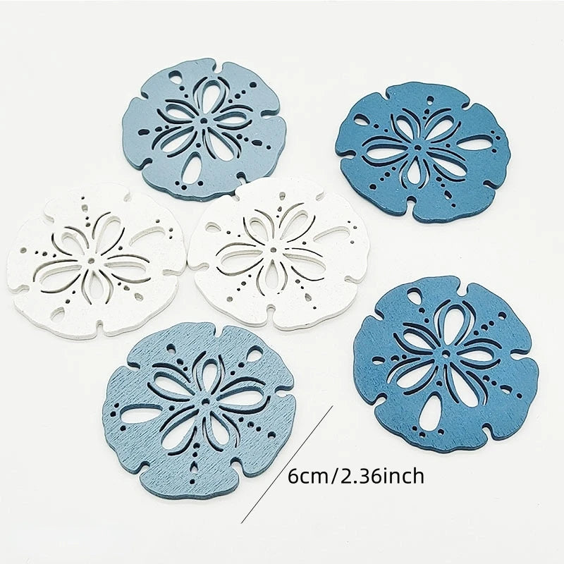 A set of twelve wooden ocean ornaments featuring various sea creatures like shells, scallops, and starfish in blue and white.