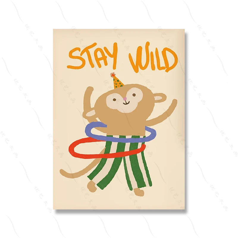 A canvas print featuring a cute, smiling lion cub with a party hat and striped pants, against a light background, with the te
