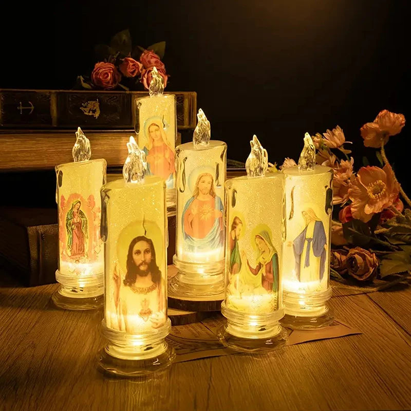 A display of several tall, glowing religious prayer candles set against a dark background.