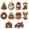 A set of Christmas diamond art ornaments featuring Santa, a snowman, and reindeer pendants.