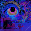A vibrant psychedelic tapestry featuring glowing geometric patterns and an eye motif in purple, blue, and neon colors.