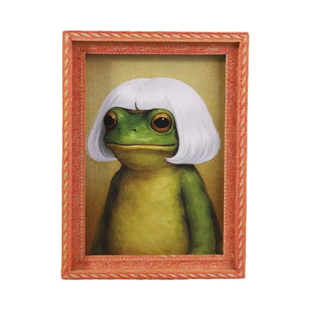 A framed painting of a green frog with white hair, set in a wooden frame.
