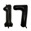 A set of two giant black foil balloons shaped like the number 17