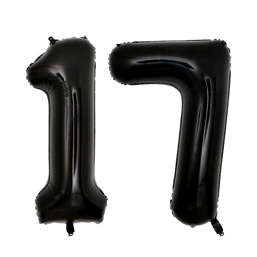 A set of two giant black foil balloons shaped like the number 17