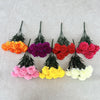 A display of silk artificial chrysanthemum bouquets in vibrant fall colors including orange, purple, red, pink, yellow, and w