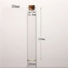 A clear glass bottle with a cork stopper, measuring 30mm in height and 12.5mm in diameter.