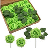 A box filled with artificial green foam roses, some are displayed individually on sticks.