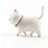 A white 3D cartoon cat figurine used as a refrigerator magnet.