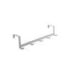 A white iron door and wall organizer rack with five hooks.