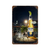A glass bottle of Corona Extra beer with a lime garnish set against a dark, moody background.