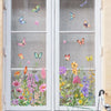 Window decal featuring colorful butterflies and flowers on a glass pane