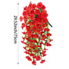 A vertical display of artificial red morning glory flowers hanging down.