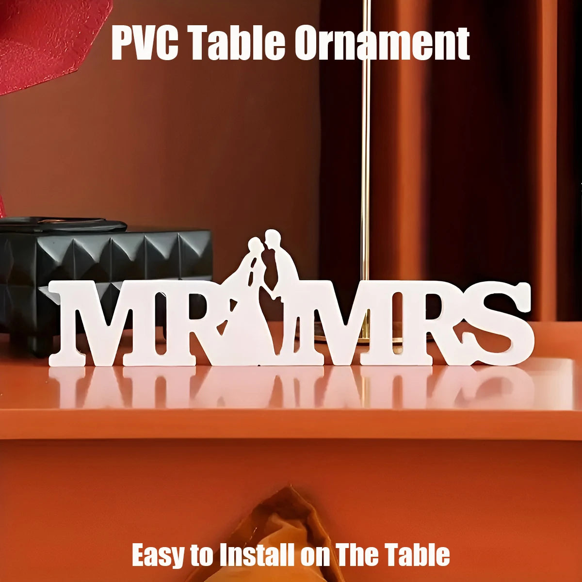 PVC table ornament featuring the initials MR MRS cut from white resin displayed on a wooden surface