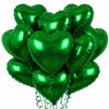 A bunch of glossy green heart-shaped foil balloons tied together.