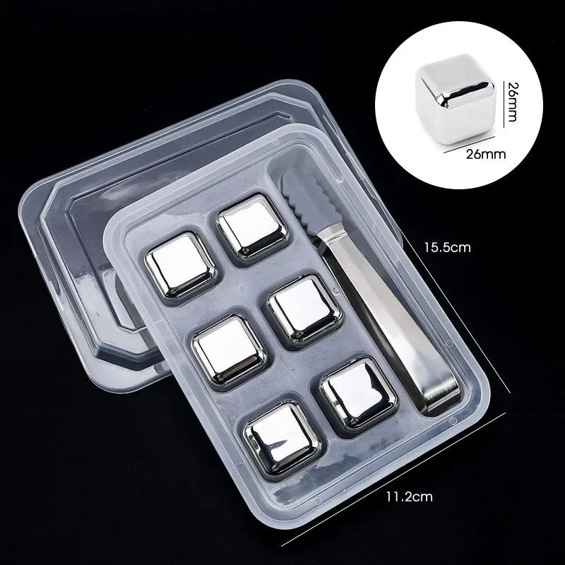 A clear plastic container holds reusable stainless steel ice cubes and a cube mold with measurement markings.