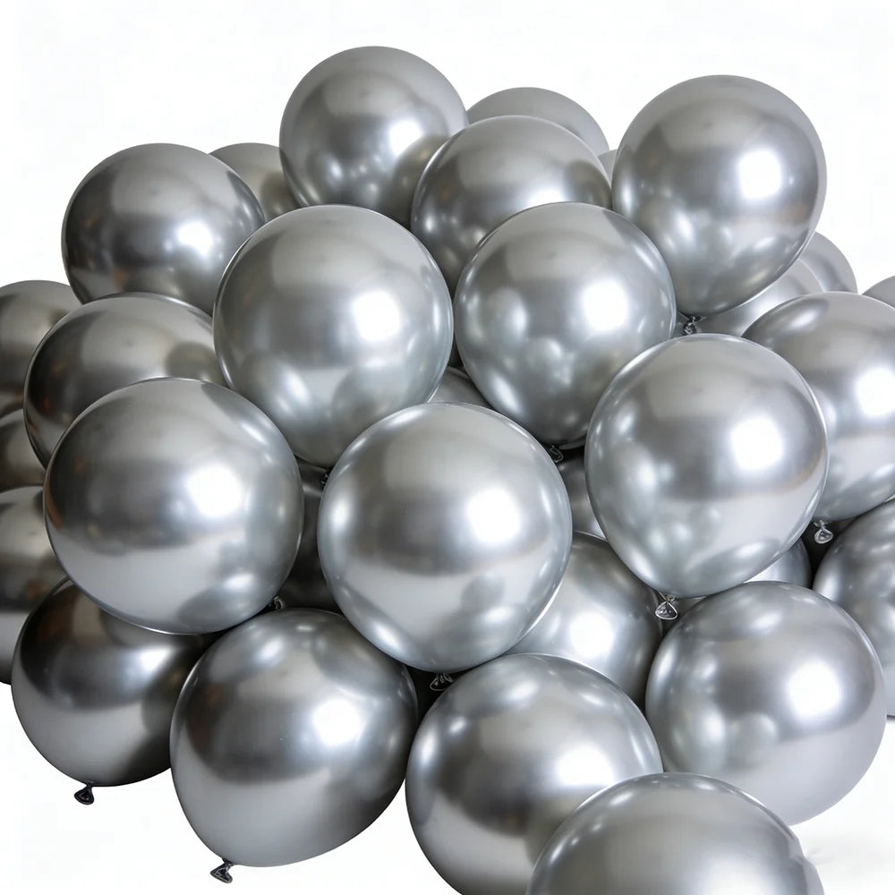 A pile of chrome metallic balloons used for celebrations.