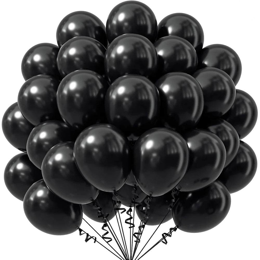 A bunch of black latex party balloons tied together with strings.