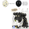 Black and gold balloon garland arch kit featuring black balloons, gold dots, and a balloon chain.