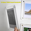 A transparent acrylic photo frame with a magnetic display stand mounted on a white wall.