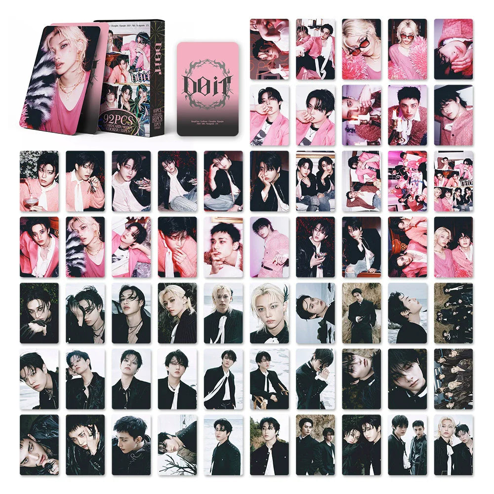 A collection of photo cards and stickers from the STRAY KIDS album set.