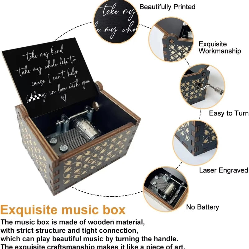 An antique engraved wooden music box with a lid open showing the intricate craftsmanship and mechanism.