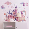 Pink castle wall decals featuring a castle, stars, clouds, and balloons on a white shelf.