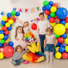 A colorful balloon garland arch featuring various colored balloons and star foil accents for a party decoration.