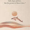 A beige canvas featuring a Bible verse about faith, hope, and love, with an orange sun and a dolphin silhouette above wavy li