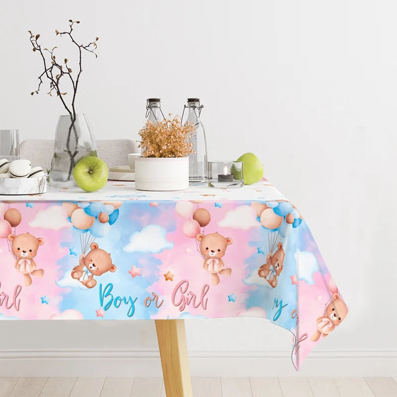 Pink and blue watercolor cloud pattern tablecloth for a gender reveal party table