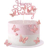 Pink butterfly cake toppers on a white frosted cake with pink and white accents.