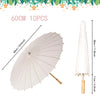 A white oil paper umbrella with a light beige handle and decorative floral border.